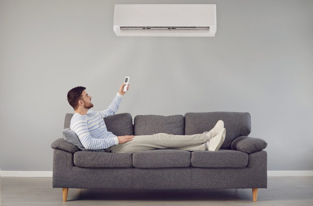 man enjoying the cool aircon