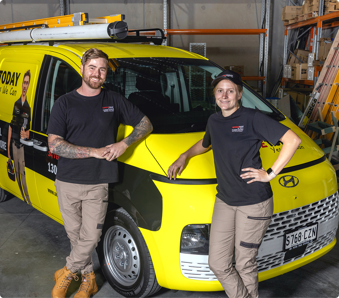 Two technicians, a man and a woman, stand by a yellow service van, likely part of a "Careers" advertisement.